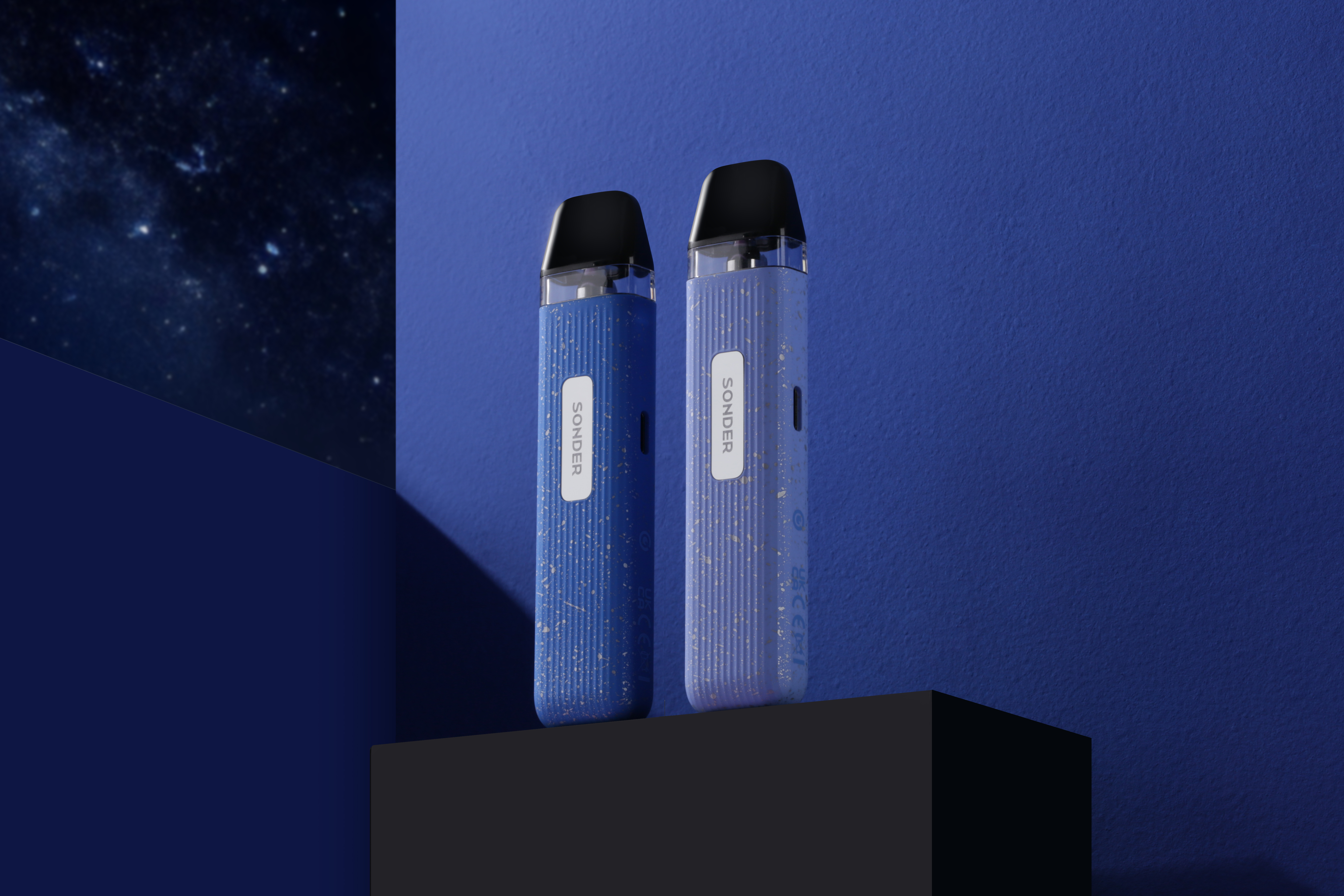 two Sonder Q vape kits in midnight colours in a night time scenario